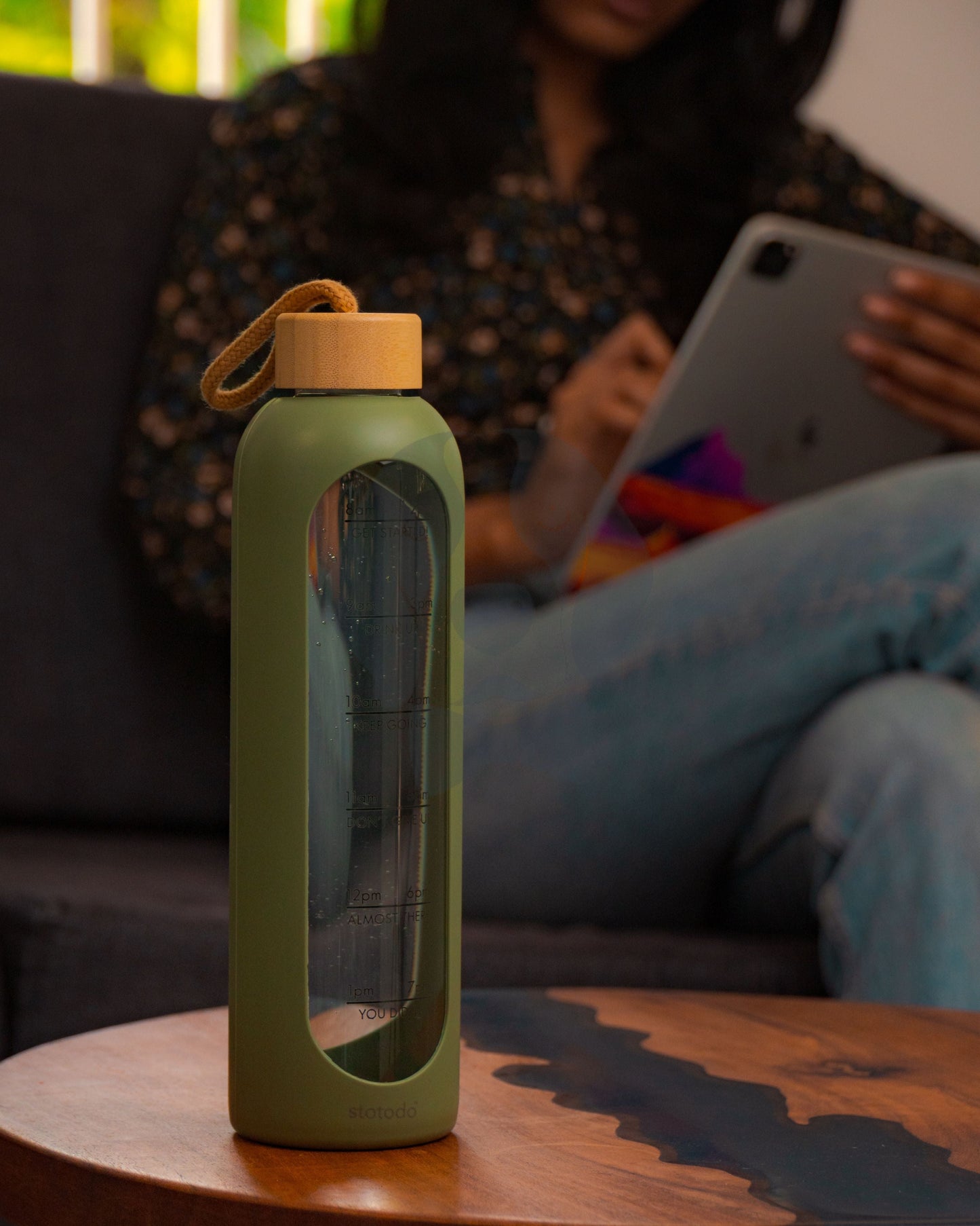 Woman using Pillar Bottle while Creating Designs