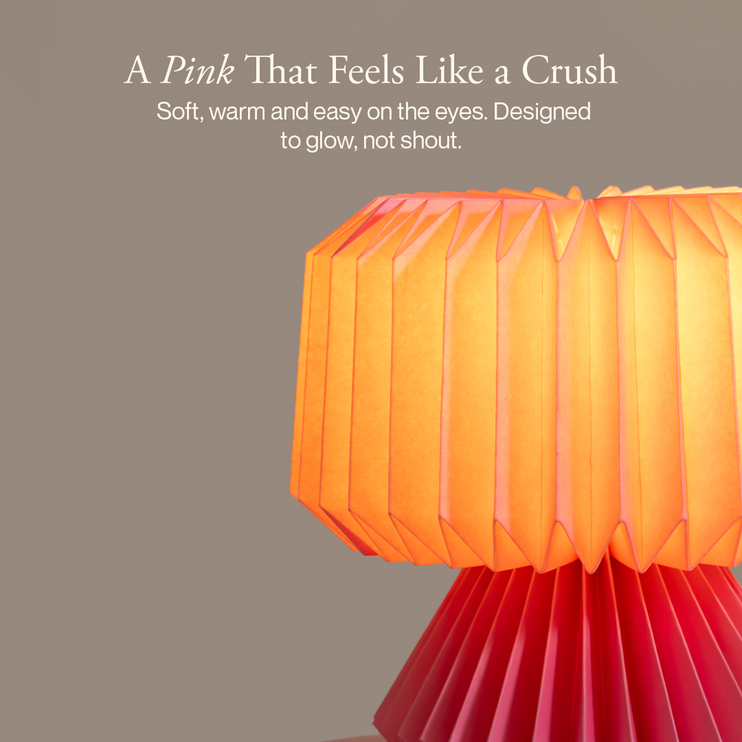 Decorative lamp with pleated design on a gray background