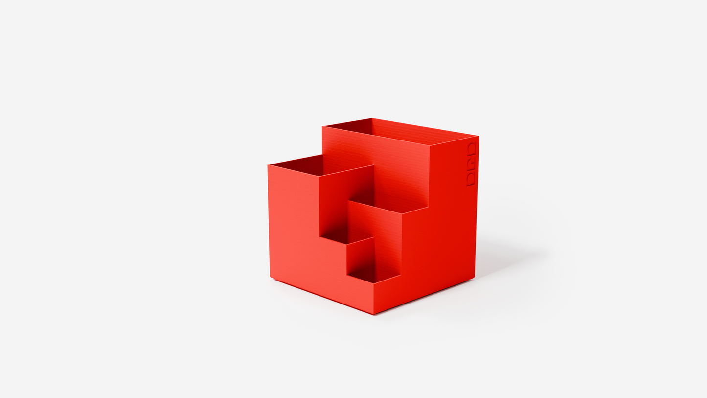 Modern Cube pen holder featuring compartments for pens, pencils, and more.