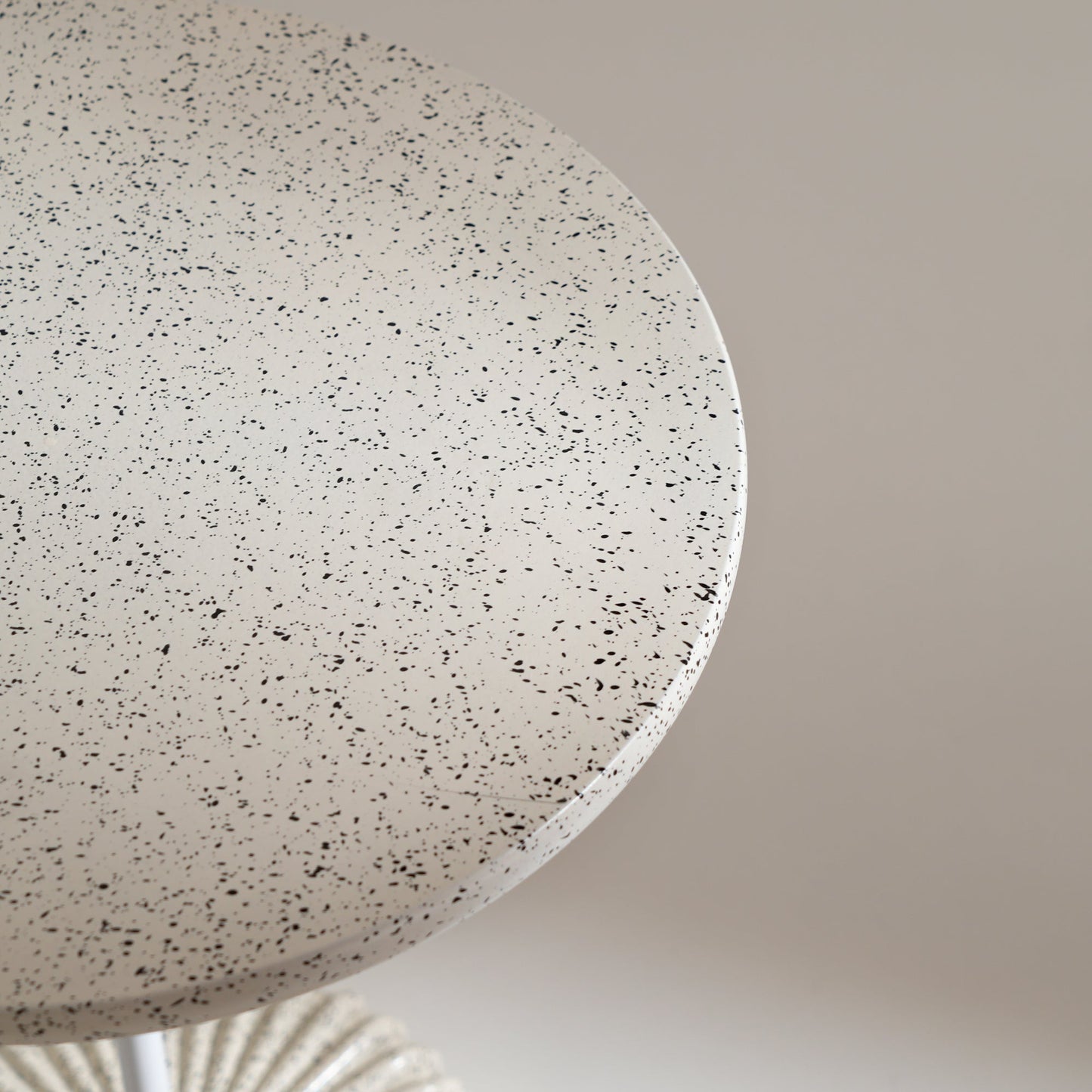 terrazzo-style off-white table