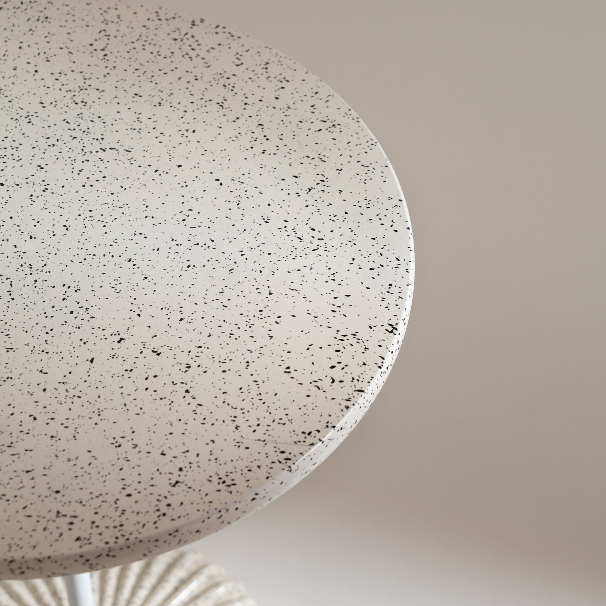 terrazzo-style off-white table