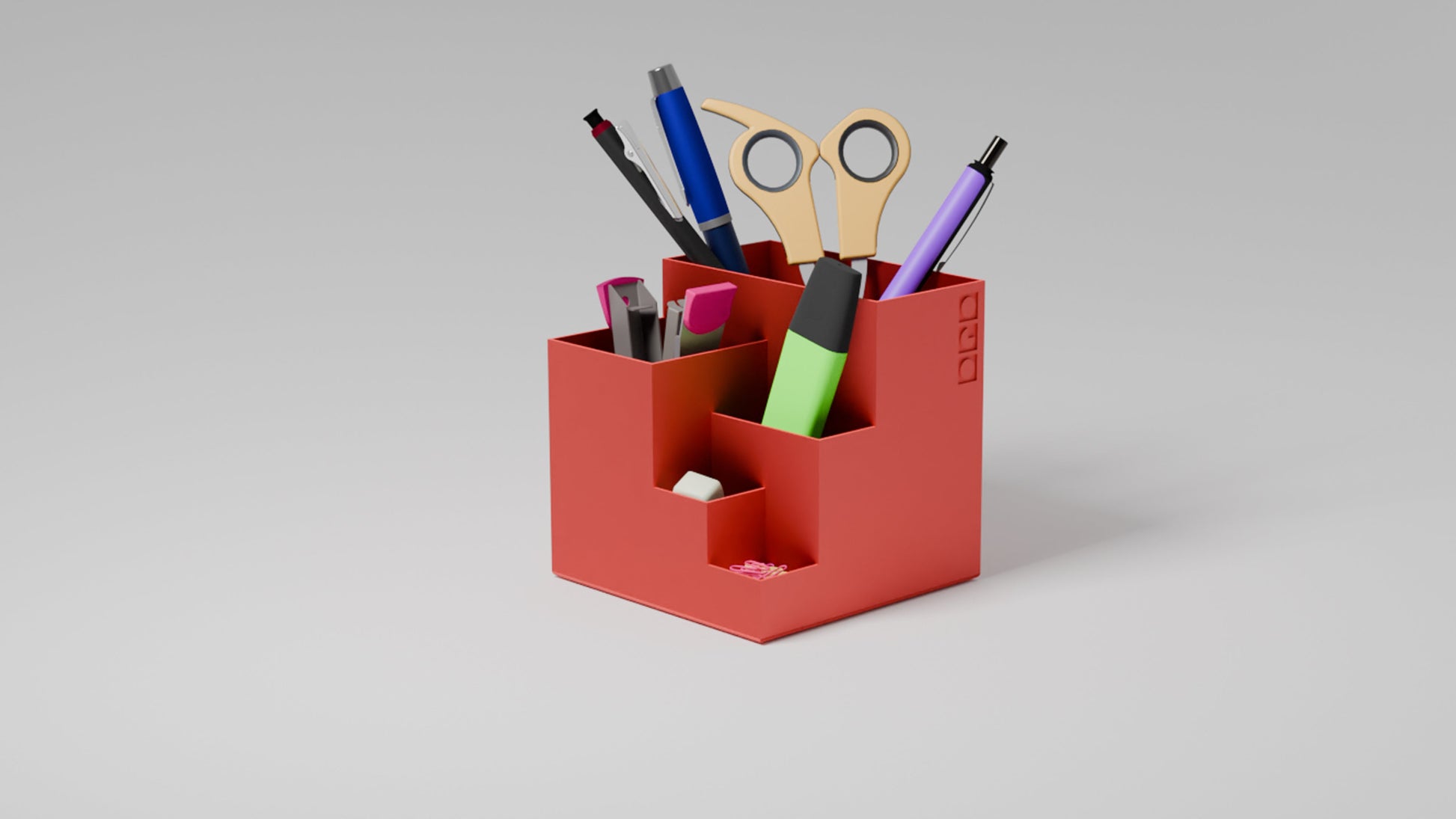Durable red pen holder with various slots for organizing pens, markers, and supplies.